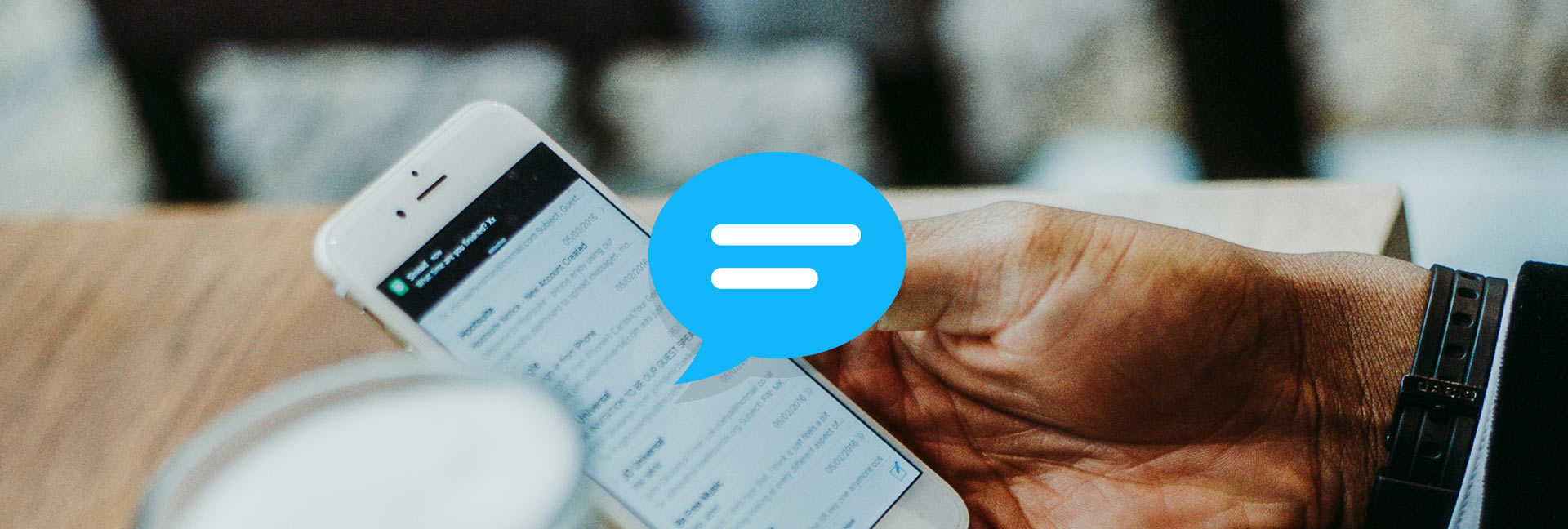 Blue cartoon speech buble coming from a phone