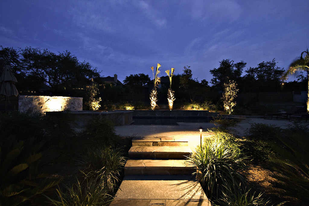 Outdoor lights leading down a pathway