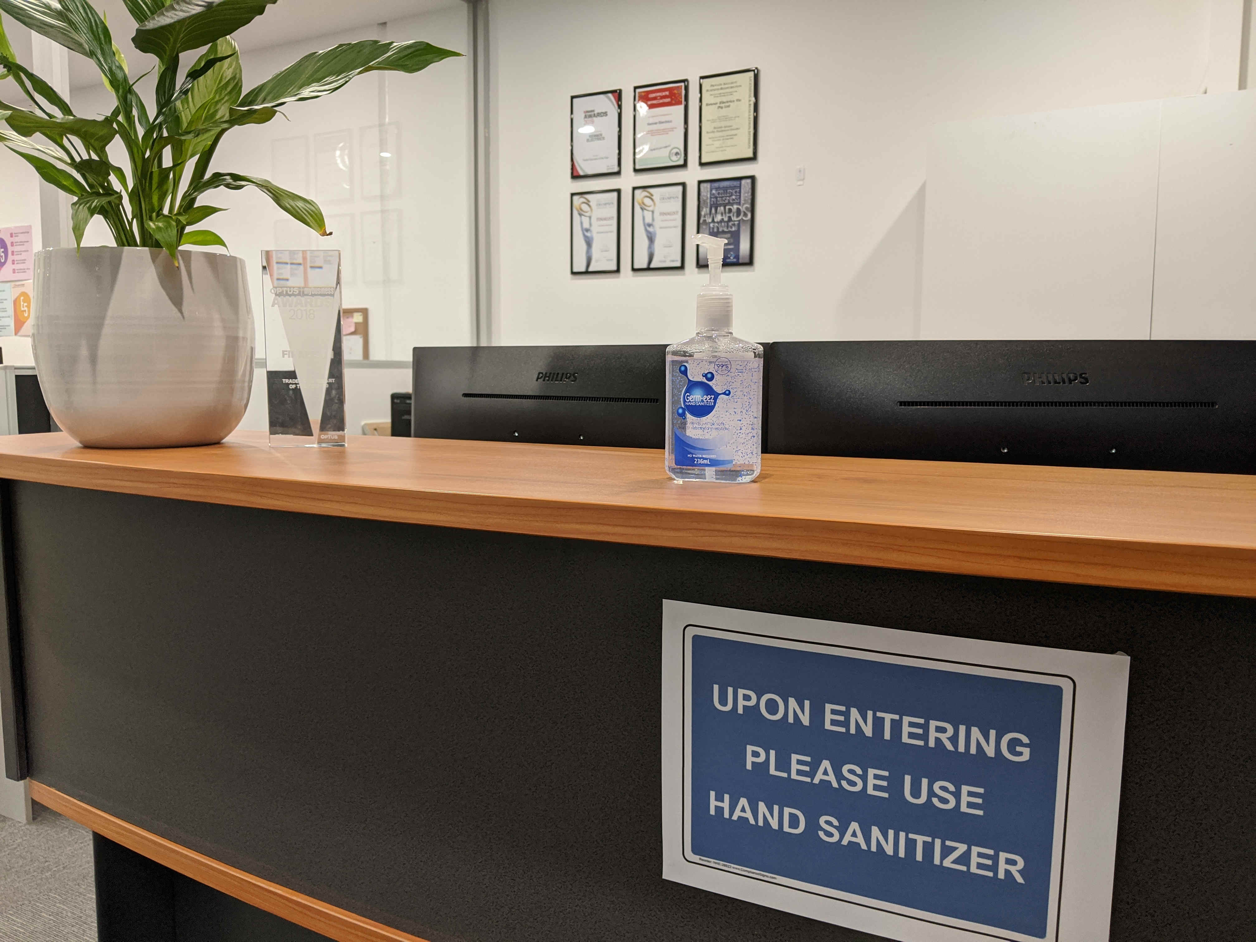 Hand Sanitiser on Reception Desk in Office