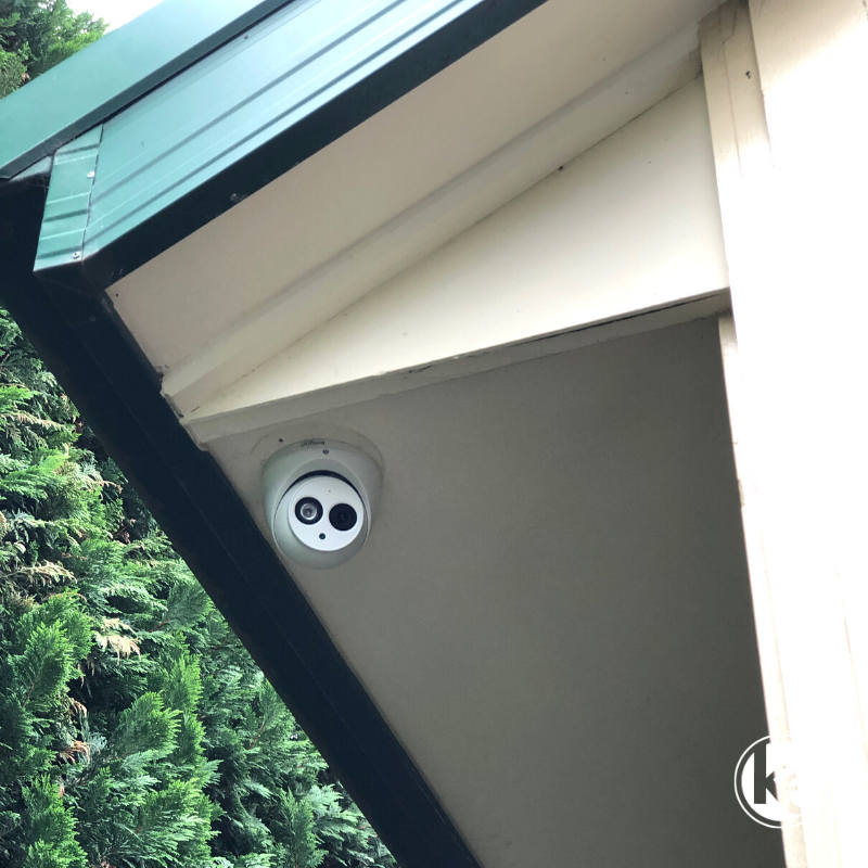 Dahua CCTV security camera on house eave