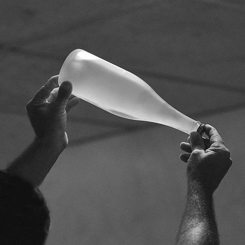 looking through a bottle of sparkling wine