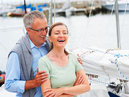 Elderly couple at a marina