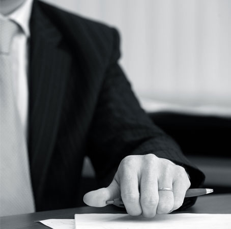 Black and white image of a businessman in a suit