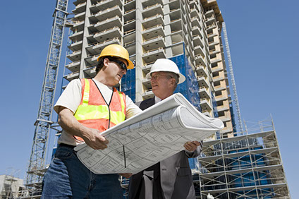 Construction foreman and architect having a conversation