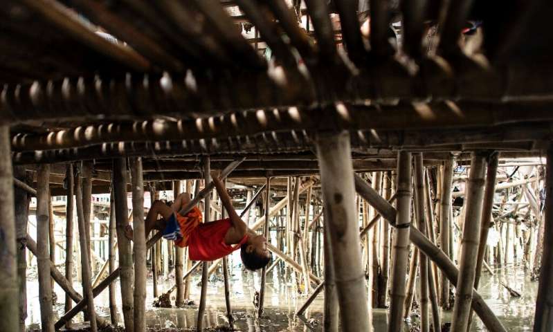Catastrophic subsidence caused by groundwater being pumped out from below is causing some Philippine cities to sink in coastal a