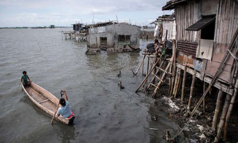 At least 5,000 people have been forced out of the mostly rural coastal areas north of Manila in recent decades as the bay water