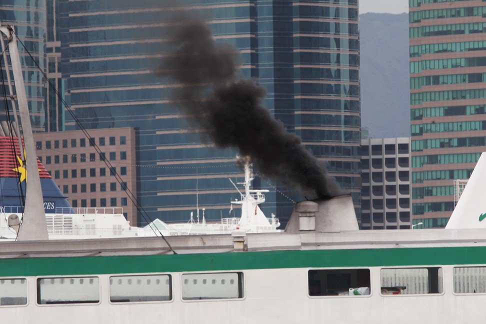 A ferry in Victoria Harbour, near Central, belches black smoke. Photo: SCMP