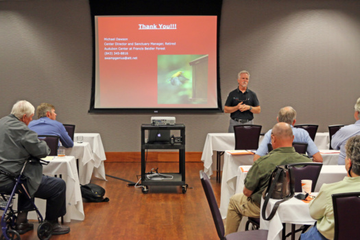 Michael Dawson address audience at workshop.