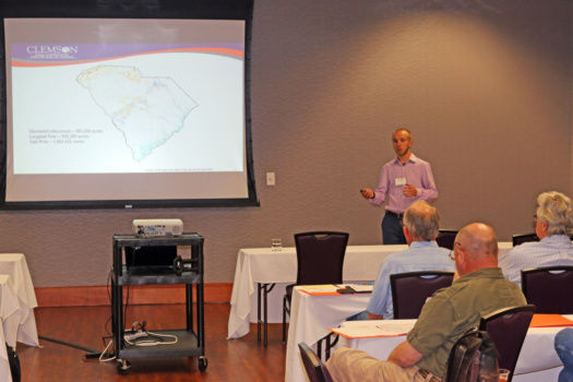 Lucas Clay addresses audience at the workshop.