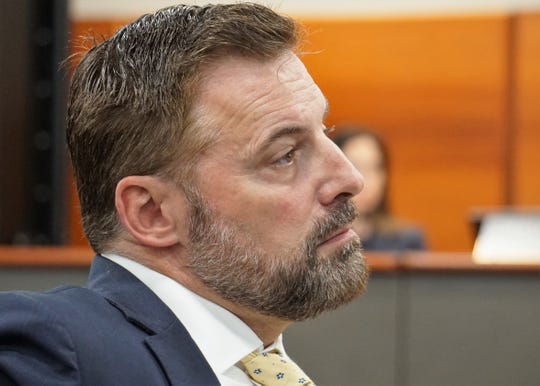 Sean Strawbridge, CEO of the Port of Corpus Christi, listens to opponents of the Port of Corpus Christi's Harbor Island marine terminal project speak at a March 28, 2019 meeting.