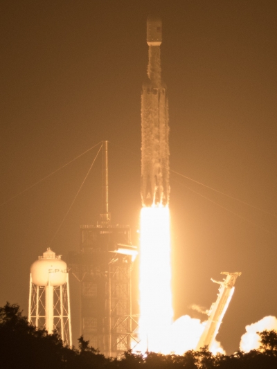 A SpaceX Falcon Heavy rocket carrying 24 satellites as part of the Department of Defense's Space Test Program-2 mission launches from NASA's Kennedy Space Center in Florida.