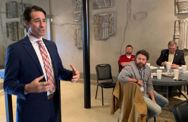 U.S. Rep. Garret Graves, R-Baton Rouge, speaks with members of the Houma and Houma-Terrebonne Rotary Clubs during a luncheon Thursday at the Main Affair banquet hall in Houma.