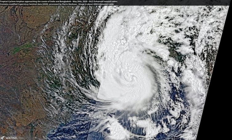 A composite satellite image of a large white cyclone