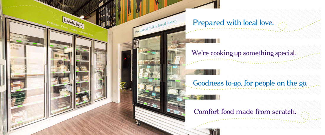 Photo of the inside of the Batch store. In the photo two freezers can be seen, full of pre-prepared frozen meals. Above the freezers are newly install fascias that promote Batch.
