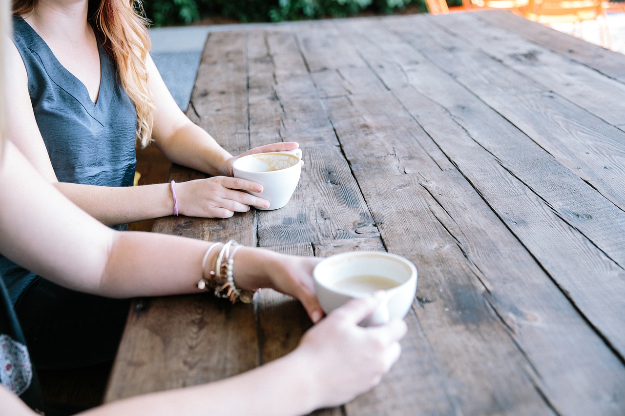 Two women enjoying coffee together
