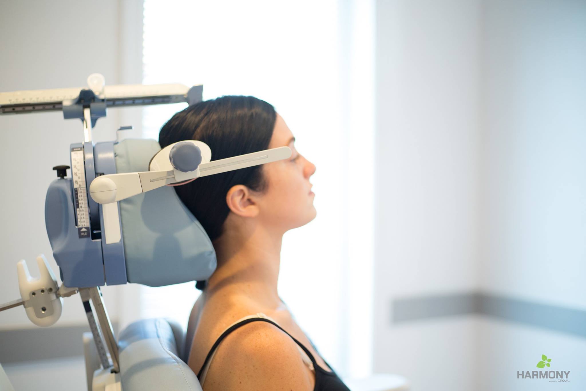 woman receiving tms transcranial magnetic stimulation therapy