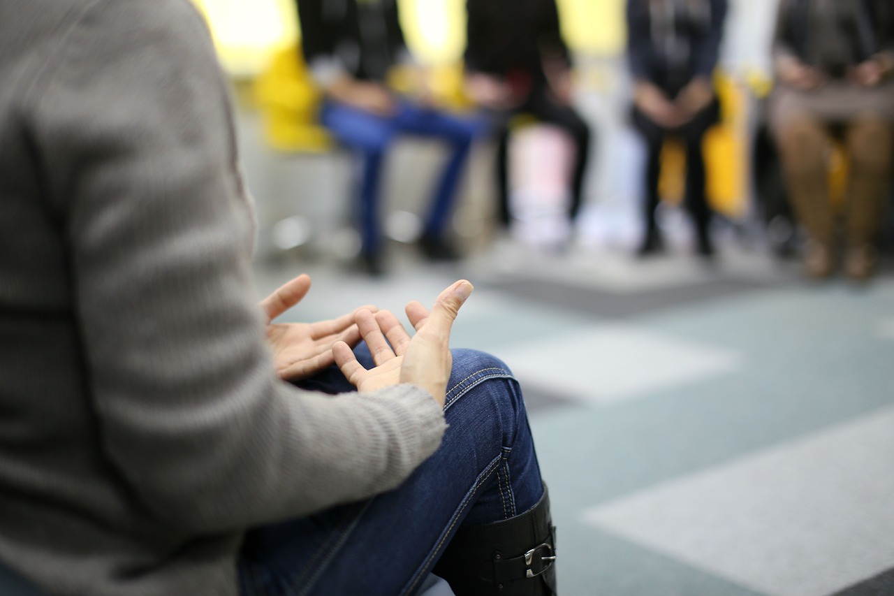 girl talking to therapy support group
