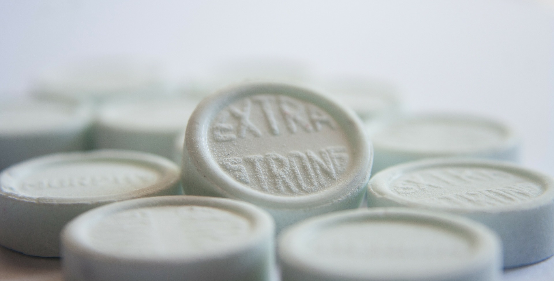 pills with "extra strong" text imprint