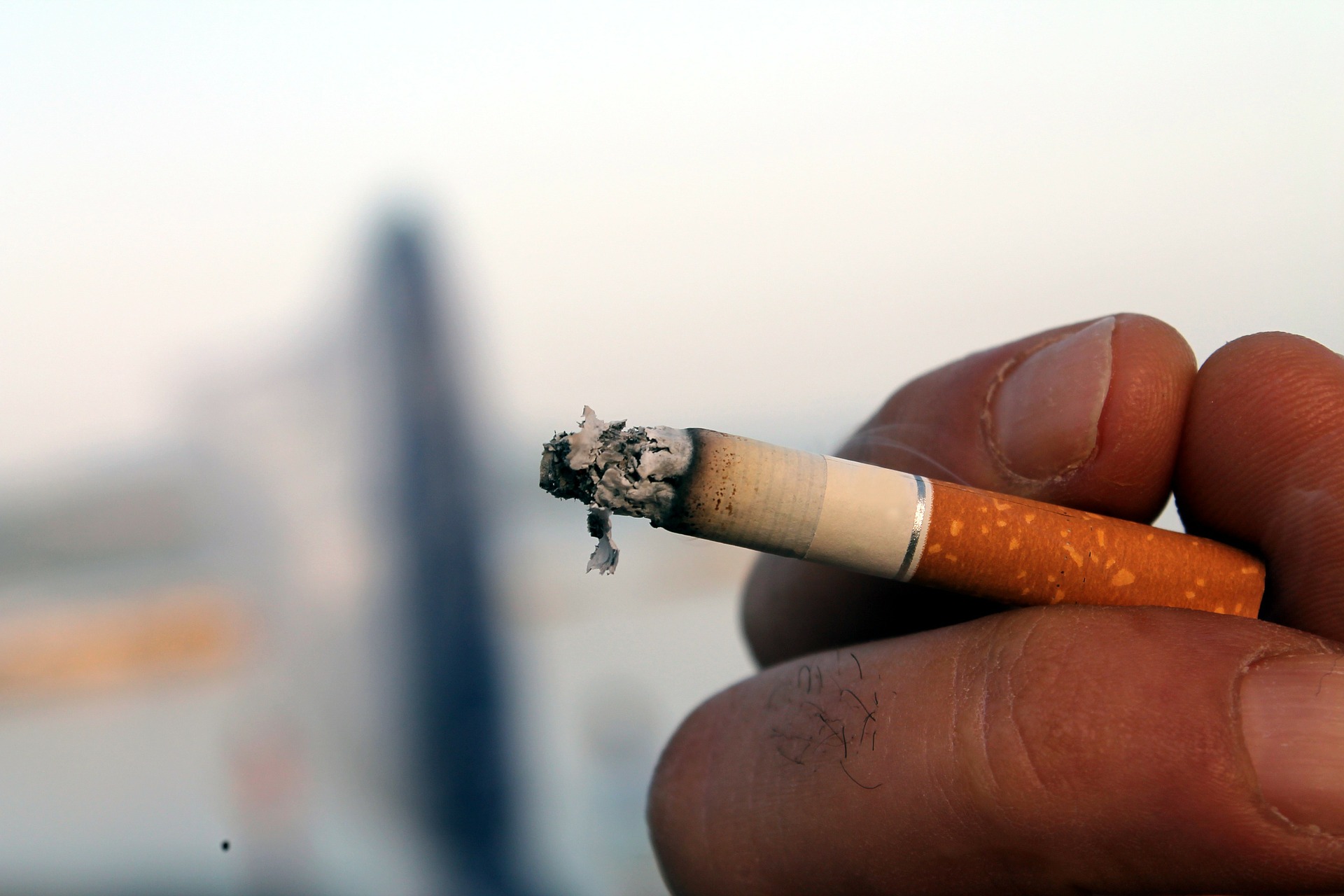 cigarette burning in user's hand