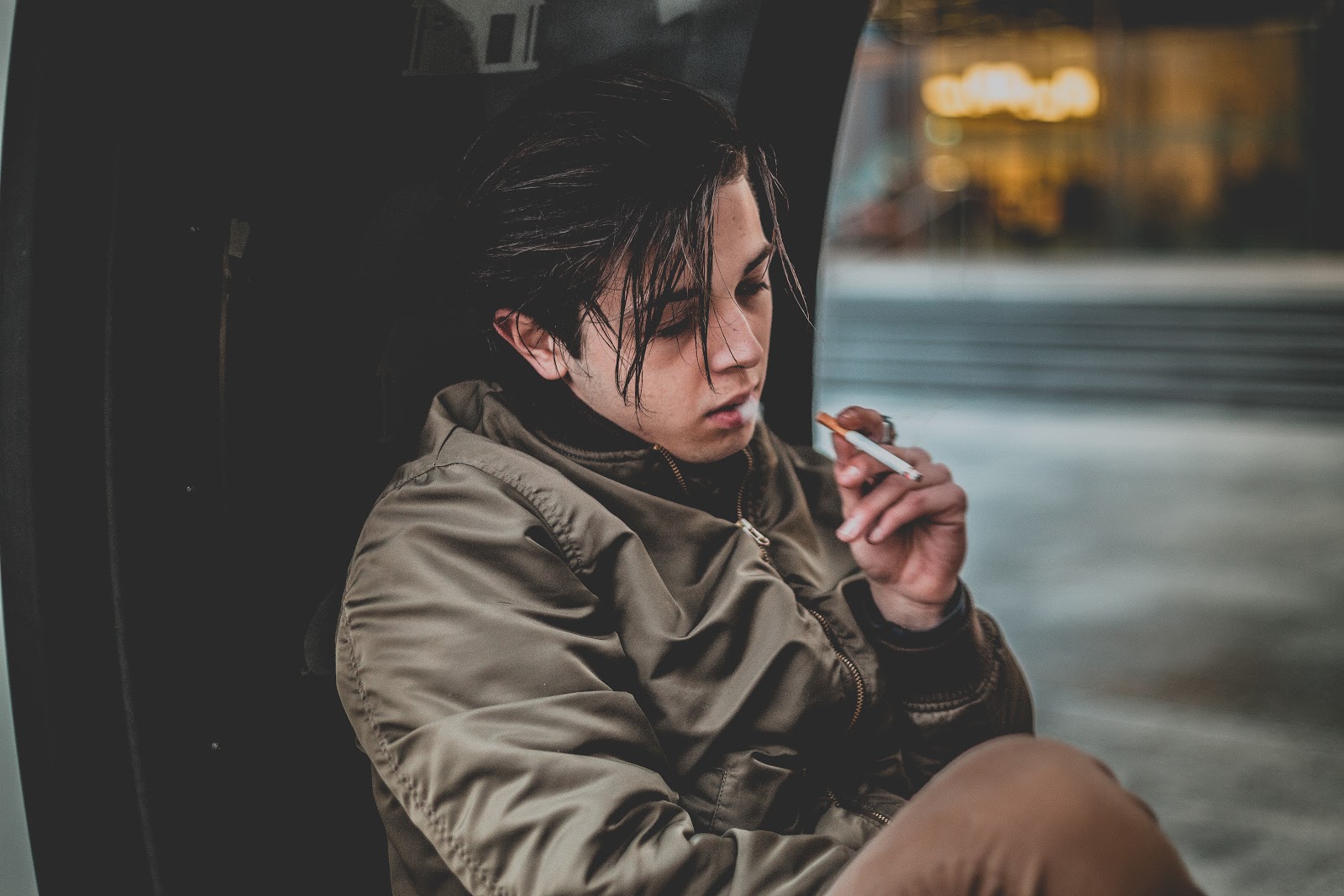 Teen smoking a cigarette