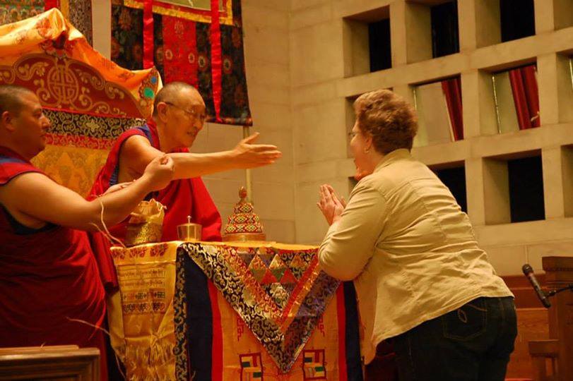 His Holiness 33rd Menri Trizin offering a blessing