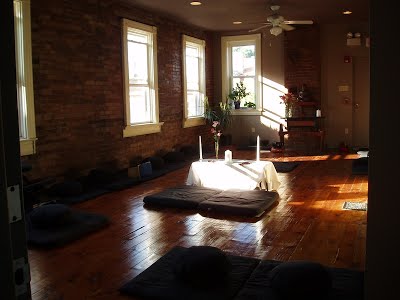 Meditation cushions and Altar at Stillpoint