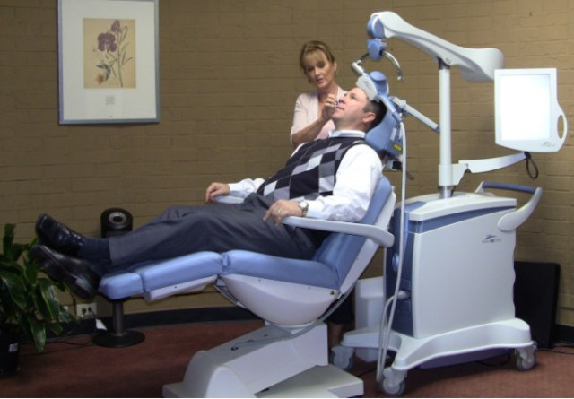 Patient receives TMS therapy from trained NeuroStar technician.