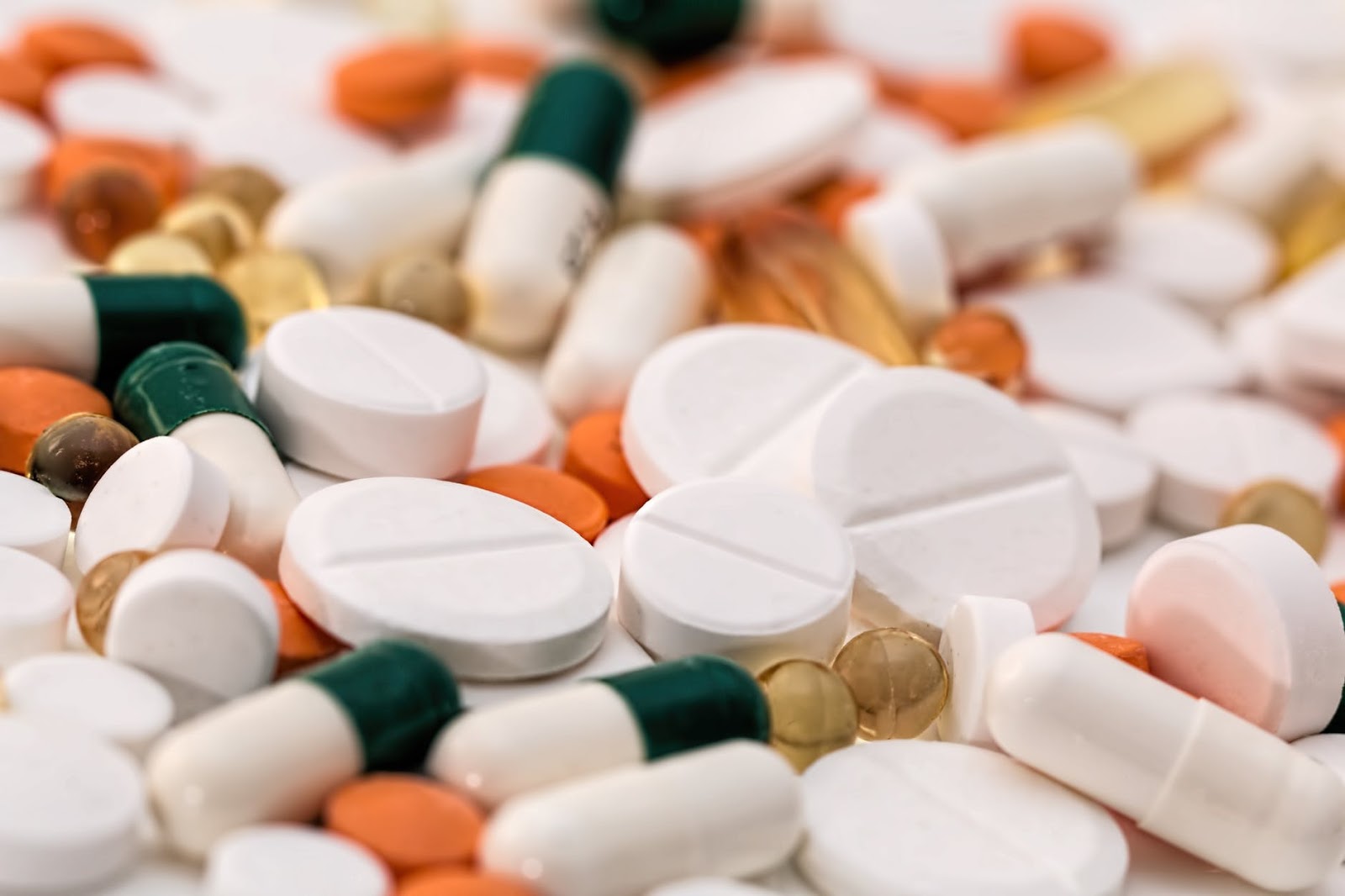 A close up of a variety of pills.