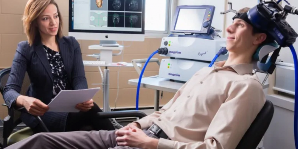 Man getting TMS treatment
