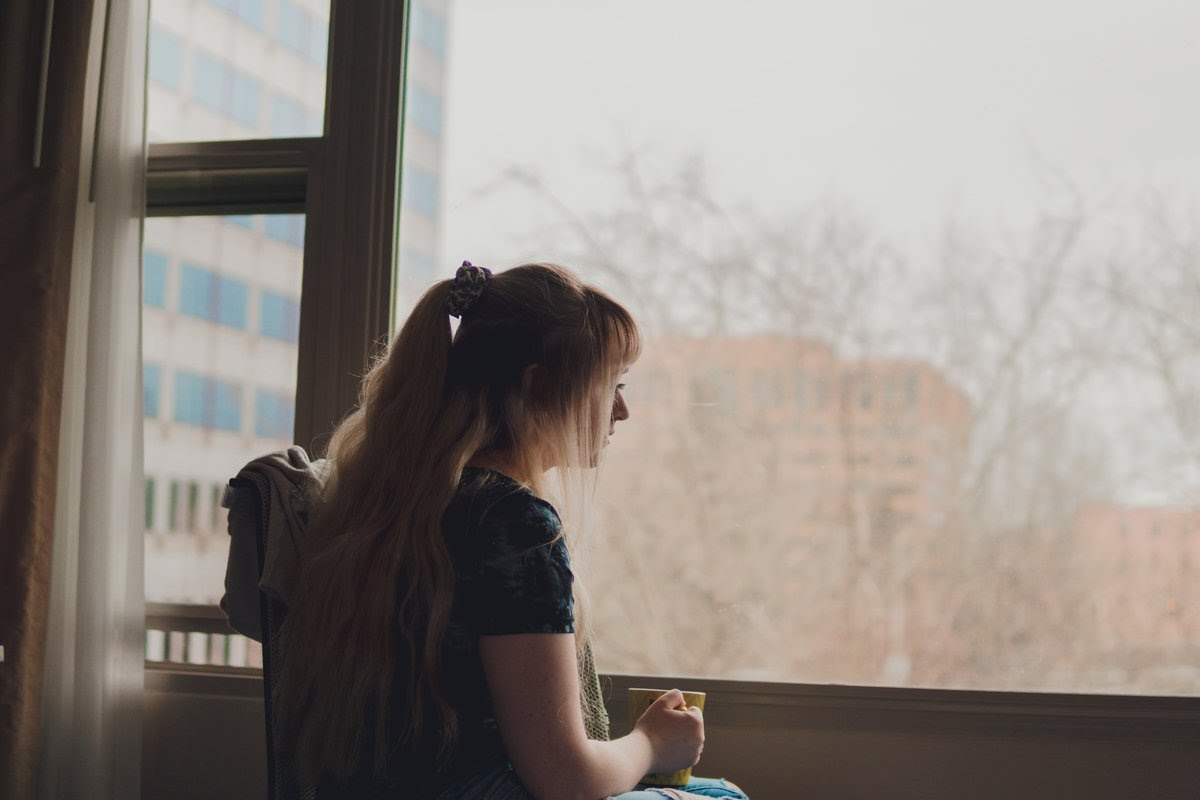 woman struggling with quarantine related adjustment disorder