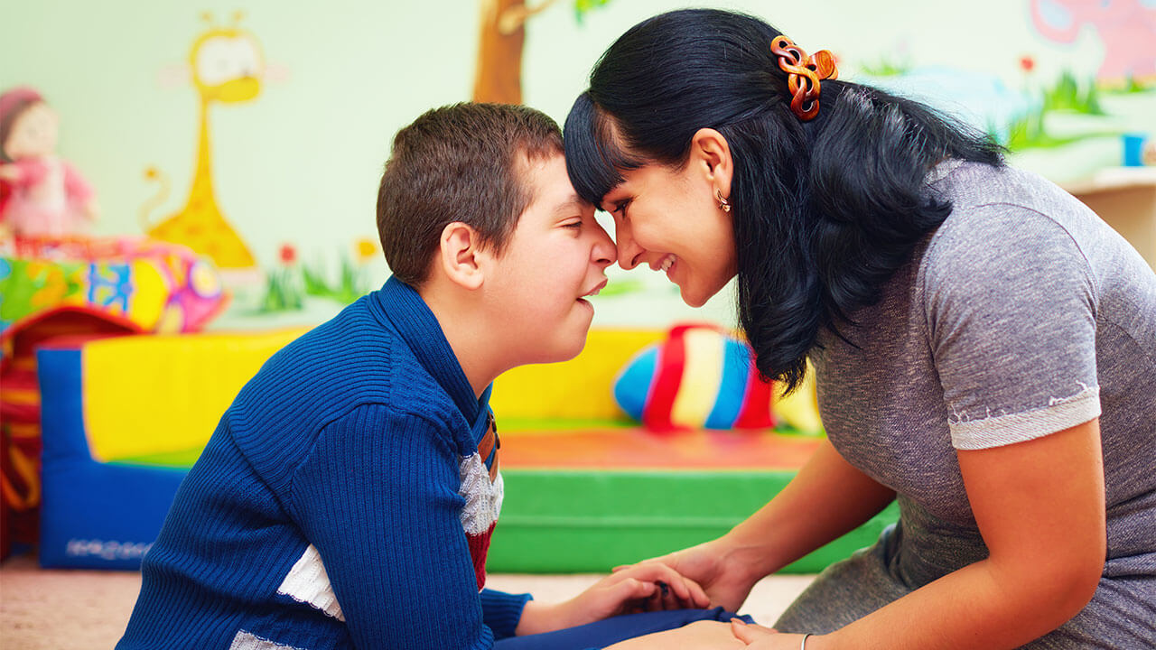 autistic child and parent