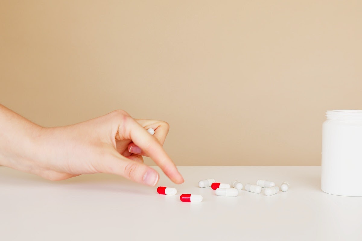 Person reaching for psychotropic medication