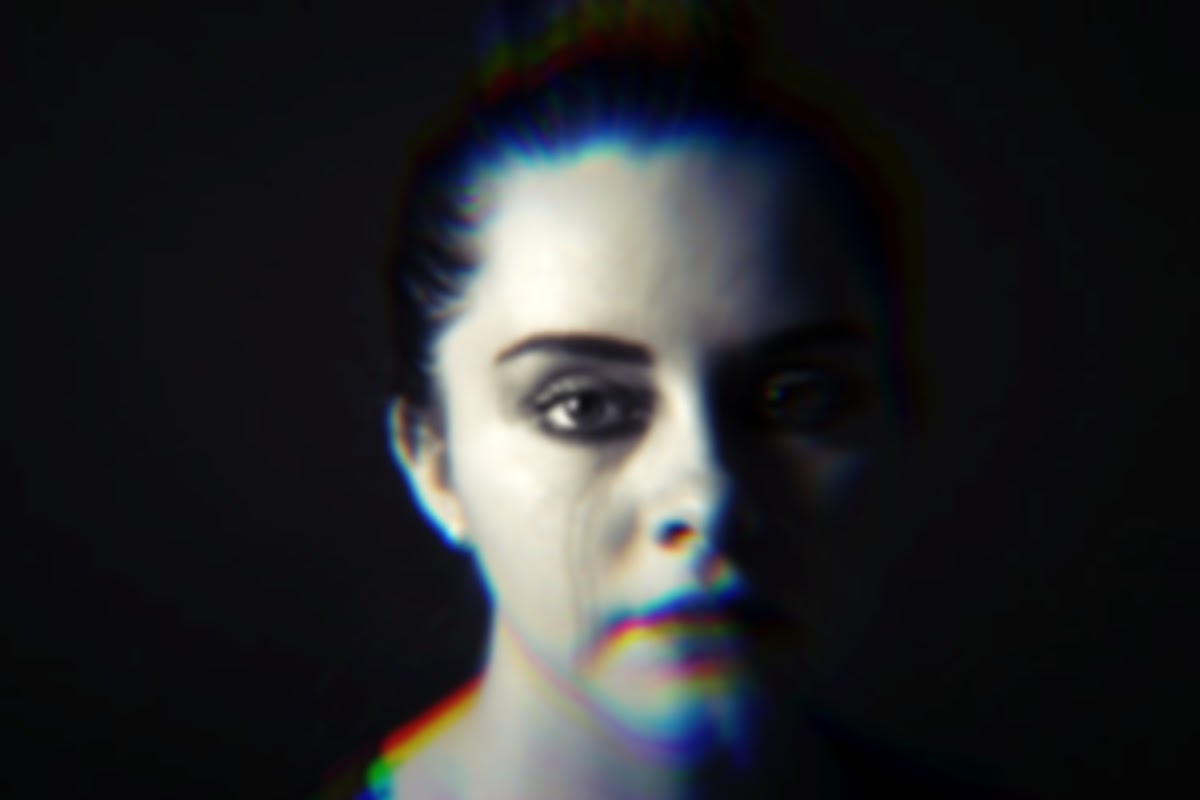 woman in black and white crying