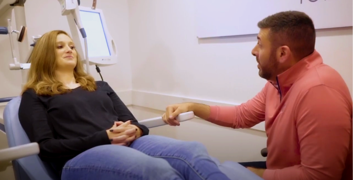 woman about to receive TMS treatment