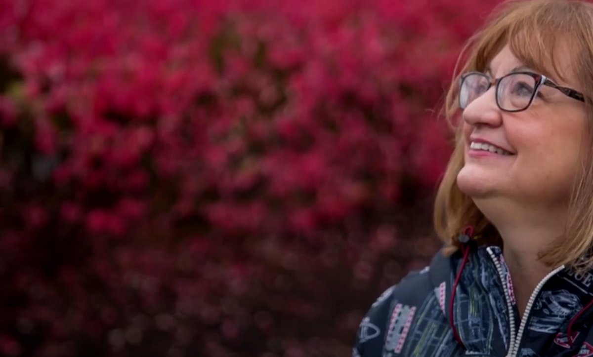 Woman is happy after TMS treatment