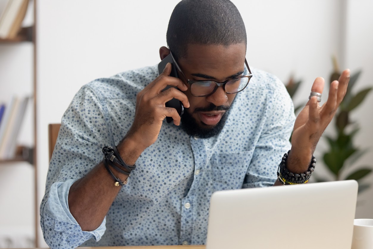 man experiencing tech anxiety and zoom fatigue