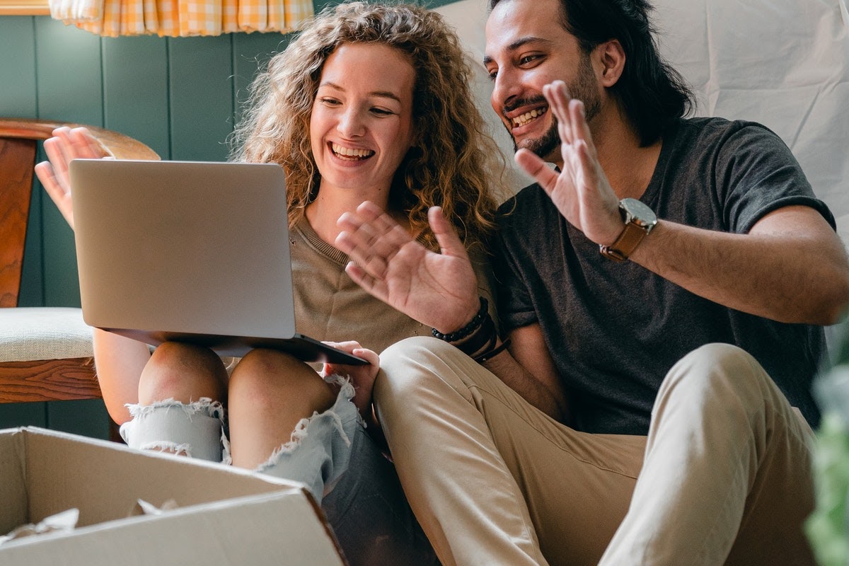 man and woman using technology to connect to loved ones
