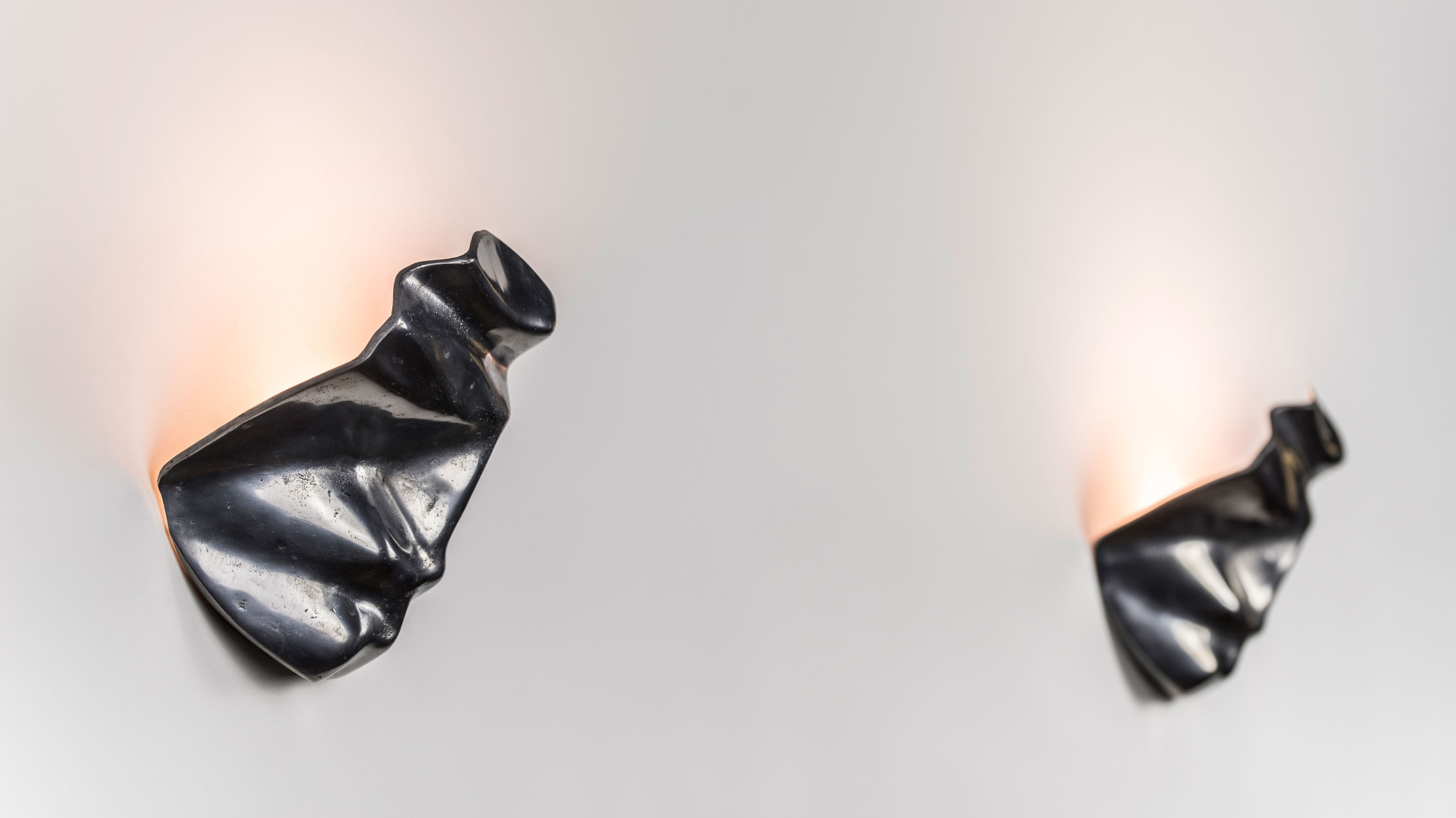 two cast aluminium uplighter names after our earth