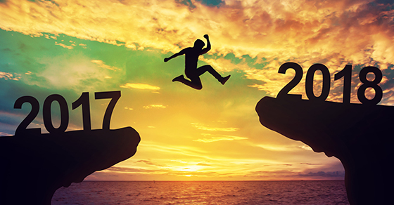 person jumping between cliffs labeled 2017 and 2018