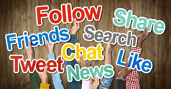 hands holding up social media buzzwords