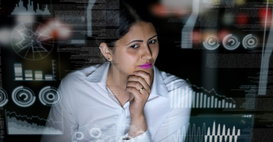 woman looking at computer analytics