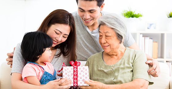 multi-generational family with gift