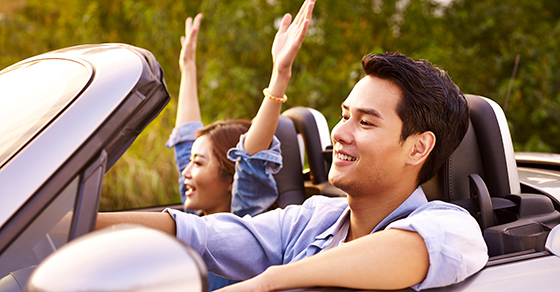 young adults in convertible