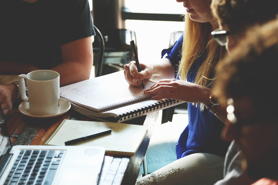 group of people working at a desk