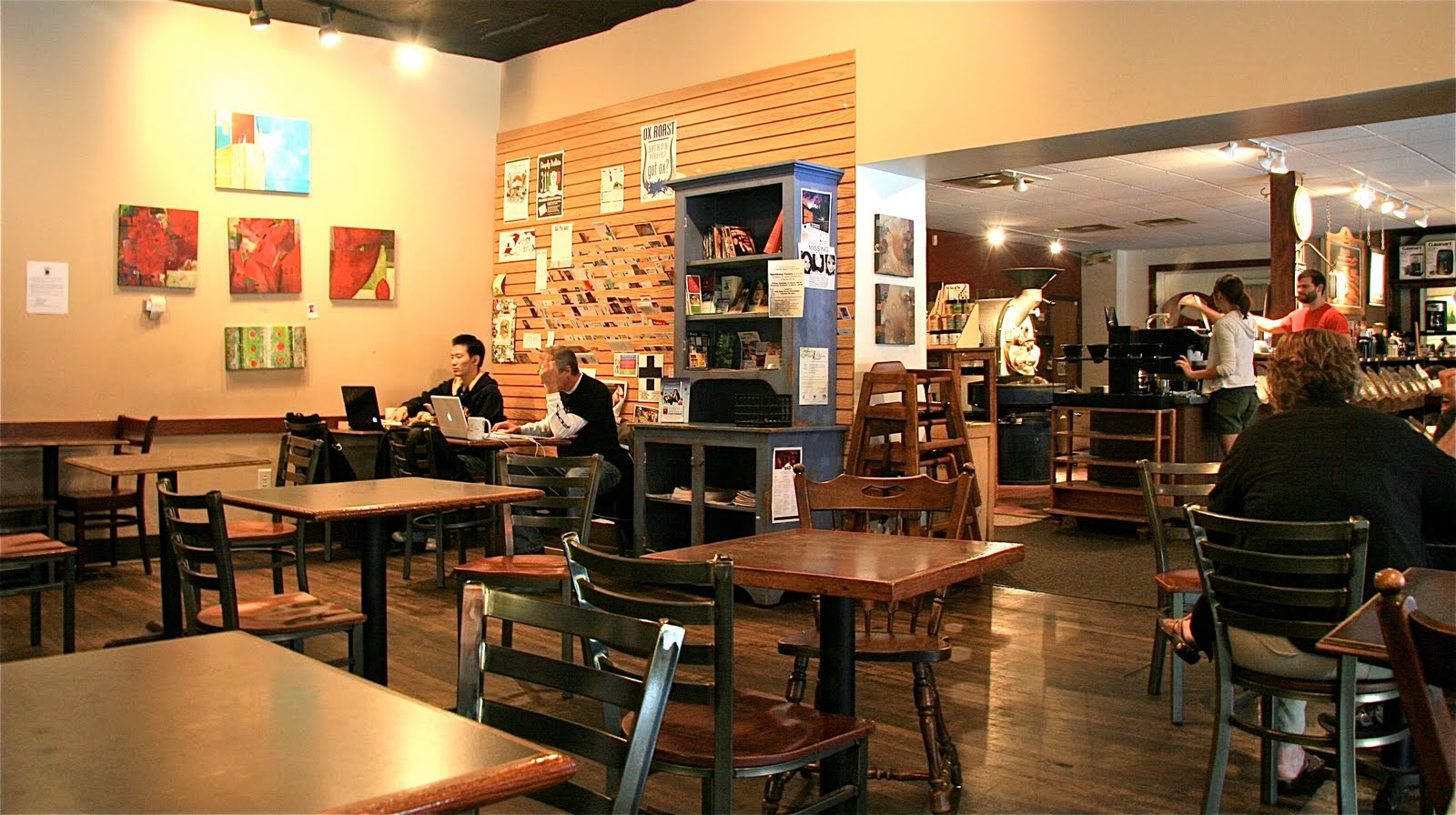people doing business inside Stauf's coffee shop