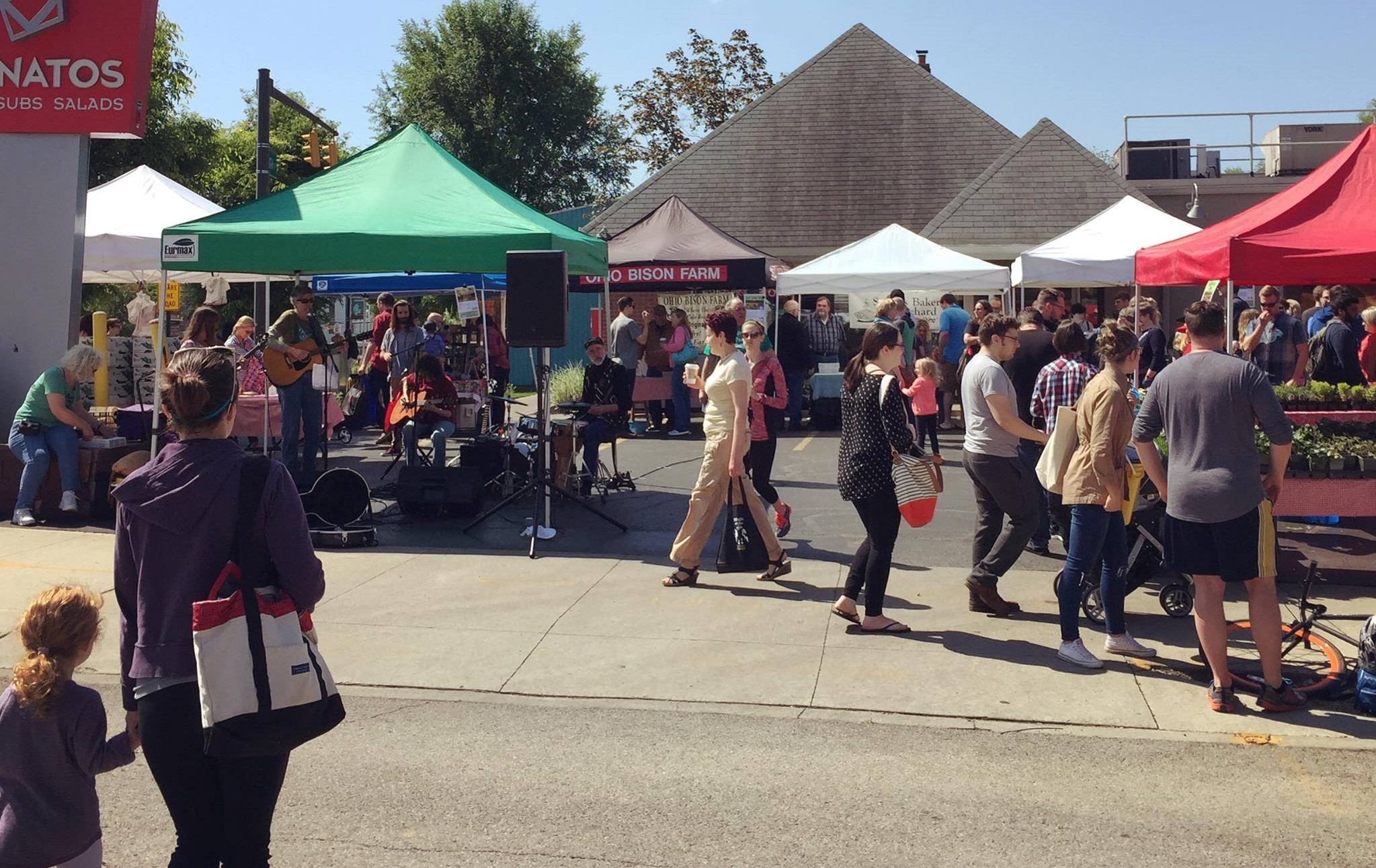 Clintonville Farmers' Market tent & people