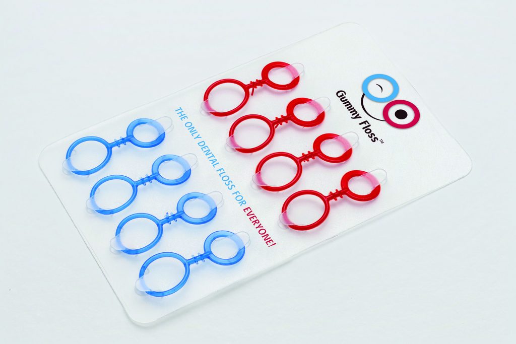 This shows a packet of GummyFloss. There are five red and five blue flossers.