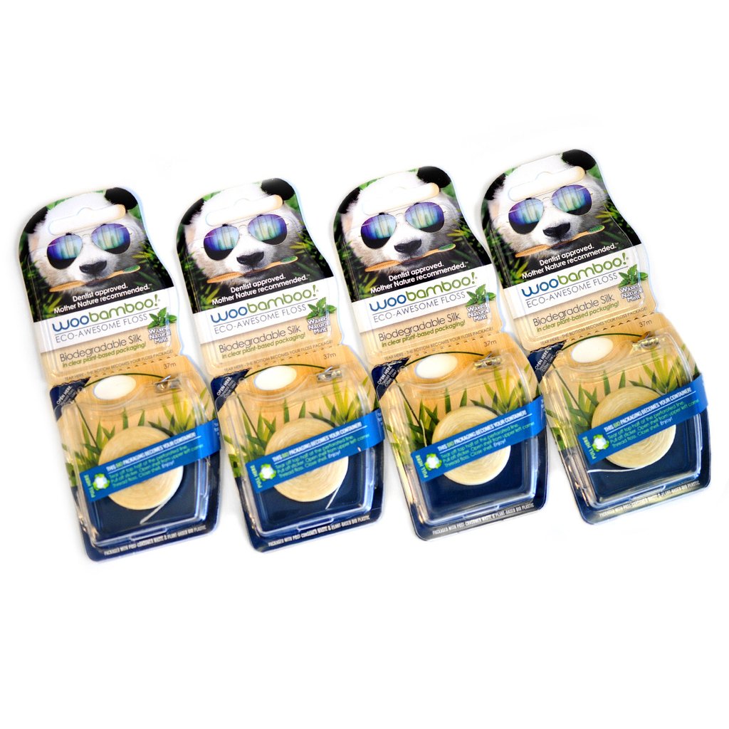 This shows four packages of WooBamboo floss. There is a panda wearing sunglasses at the top, and there is a description of the floss above the role of floss itself.