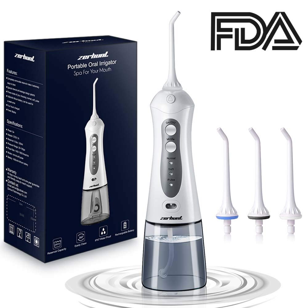 This shows a box of Zerhart's water flosser. The flosser itself is bigger and the highlight of the image. There are three interchangeable tips shown, too.