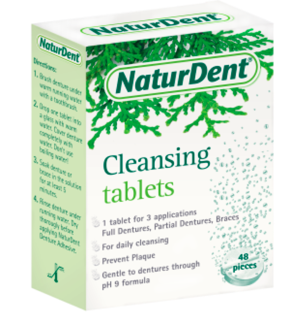 NaturDent Cleansing Tablets box. White box with green lettering and pine needles.